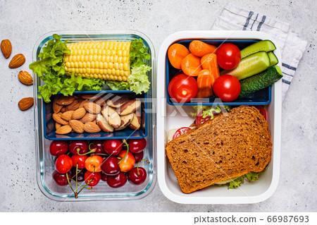 Lunch box with healthy fresh food. Lunch box with healthy fresh food. 66987693