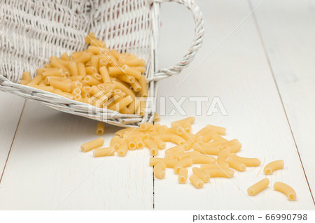 pasta on white old table 66990798