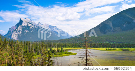 Beautiful landscape with Rocky Mountains in Jasper National Park, Alberta, Canada Beautiful landscape with Rocky Mountains in Jasper National Park, Alberta, Canada 66992194