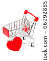 Shopping cart with a heart symbol 66992885