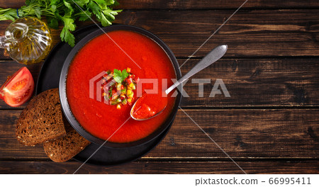Top view of a plate with summer cold gazpacho soup 66995411