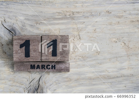 cube calendar for march on wooden background with cube calendar for march on wooden background with 66996352