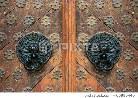 Historic old doors in Tallinn, Estonia. Door decorations in the form of lion heads 66996440