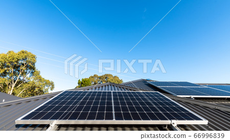Solar panels in landscape position on house roof 66996839