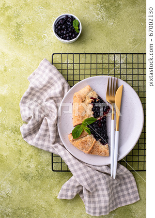 Sweet homemade galette pie with blueberry 67002130