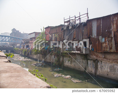Poor and impoverished slums of Dharavi in the city of Mumbai. Poor and impoverished slums of Dharavi in the city of Mumbai. 67005092