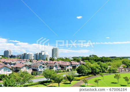 Cityscape with refreshing blue sky 67006284