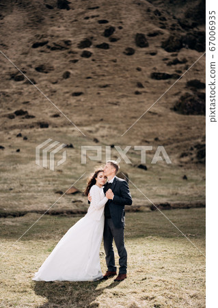 Wedding couple on the background of a rocky mountain. 67006935