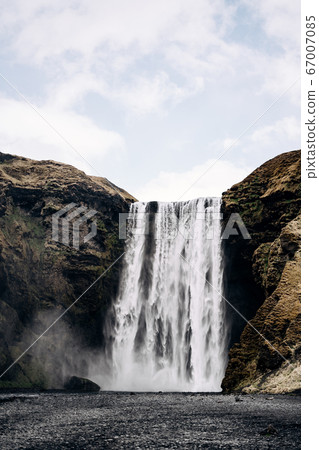 Skogafoss waterfall in the south of Iceland, on the golden ring. Skogafoss waterfall in the south of Iceland, on the golden ring. 67007085