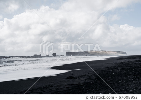Iceland Vik south coast in winter shore on black beach volcanic Iceland Vik south coast in winter shore on black beach volcanic 67008952