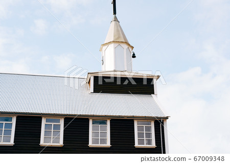 Black Church in Iceland. Picturesque autumn landscape with famous picturesque black church of Budir at Snaefellsnes peninsula region in Iceland Black Church in Iceland. Picturesque autumn landscape with famous picturesque black church of Budir at Snaefellsnes peninsula region in Iceland 67009348