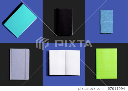 Notebooks on a tiled desk from above Notebooks on a tiled desk from above 67011994