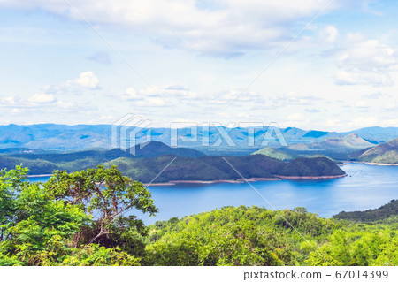 Beautiful scenery views of nature with a large reservoir above the Srinagarind Dam at Rai Ya Yam in Si Sawat District, Kanchanaburi Thailand. 67014399