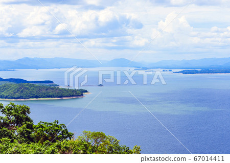 Beautiful scenery views of nature with a large reservoir above the Srinagarind Dam at Rai Ya Yam in Si Sawat District, Kanchanaburi Thailand. Beautiful scenery views of nature with a large reservoir above the Srinagarind Dam at Rai Ya Yam in Si Sawat District, Kanchanaburi Thailand. 67014411