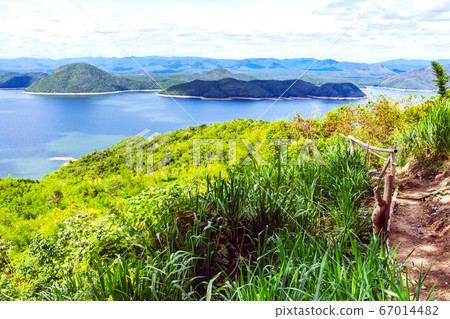 Beautiful scenery views of nature with a large reservoir above the Srinagarind Dam at Rai Ya Yam in Si Sawat District, Kanchanaburi Thailand. Beautiful scenery views of nature with a large reservoir above the Srinagarind Dam at Rai Ya Yam in Si Sawat District, Kanchanaburi Thailand. 67014482