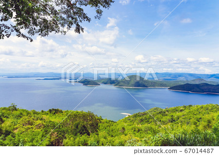Beautiful scenery views of nature with a large reservoir above the Srinagarind Dam at Rai Ya Yam in Si Sawat District, Kanchanaburi Thailand. Beautiful scenery views of nature with a large reservoir above the Srinagarind Dam at Rai Ya Yam in Si Sawat District, Kanchanaburi Thailand. 67014487