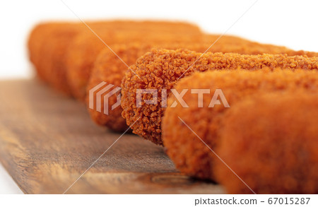 Brown crusty dutch kroketten on a serving tray, 67015287
