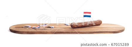Wooden tray with frikadellen, just one left, a 67015289
