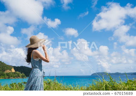 Beautiful tropical sea and one-piece female image 67015689