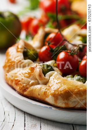 Vegetarian tart with broccoli, tomato, paprica and Vegetarian tart with broccoli, tomato, paprica and 67020743