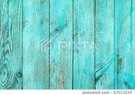 Weathered blue wooden background texture. Shabby wood teal or turquoise green painted. Vintage beach wood backdrop. Weathered blue wooden background texture. Shabby wood teal or turquoise green painted. Vintage beach wood backdrop. 67021034
