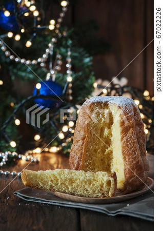 Christmas cake panetone on the wooden table 67022226