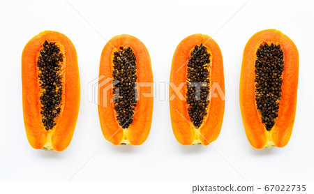 Sweet ripe papaya on white background. Sweet ripe papaya on white background. 67022735