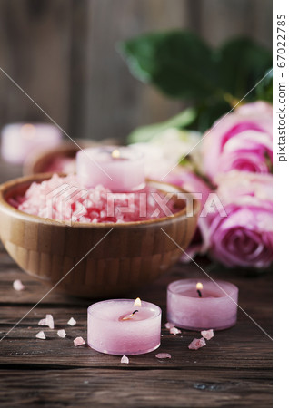 SPA treatment with pink salt and candles SPA treatment with pink salt and candles 67022785