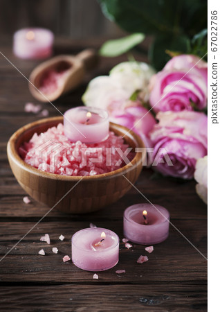 SPA treatment with pink salt and candles SPA treatment with pink salt and candles 67022786
