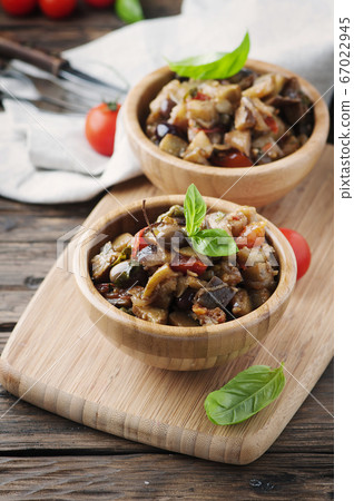 Traditional italian dish with eggplant and tomato Traditional italian dish with eggplant and tomato 67022945