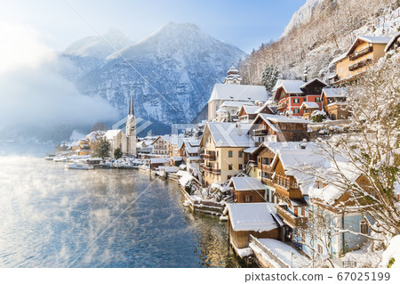 Classic view of Hallstatt with ship in winter, Austria 67025199