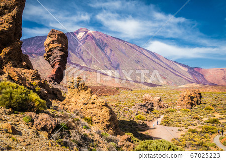 Pico del Teide with famous Roque Cinchado rock formation on Tenerife, Canary Islands, Spain Pico del Teide with famous Roque Cinchado rock formation on Tenerife, Canary Islands, Spain 67025223