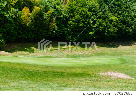 Near the golf course green 67027693