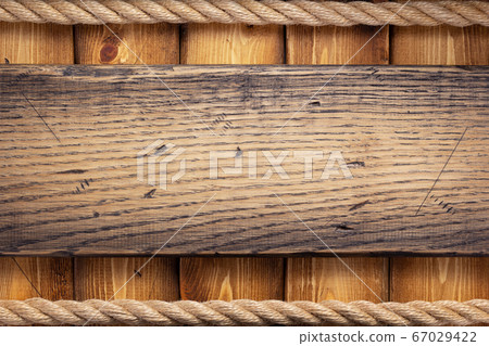 ship rope border at wooden background ship rope border at wooden background 67029422