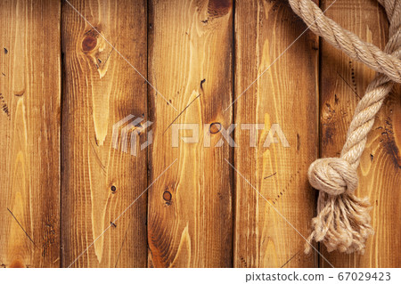 ship rope border at wooden background ship rope border at wooden background 67029423