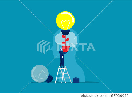Business man in a suit holding a light bulb on top head human chang idea concept 67030011