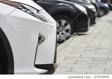 Lots of parked cars in public city parking, Lots of parked cars in public city parking, 67030993