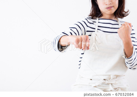 A woman punching A woman punching 67032084