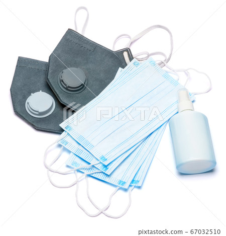White bottle of cream, lotion, sanitizer or liquid soap and protective mask isolated on white background White bottle of cream, lotion, sanitizer or liquid soap and protective mask isolated on white background 67032510