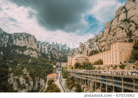 Santa Maria De Montserrat. Benedictine Abbey In Mountain Of Montserrat, In Monistrol De Montserrat, In Catalonia, Spain. Timelapse, Time-lapse 67033062