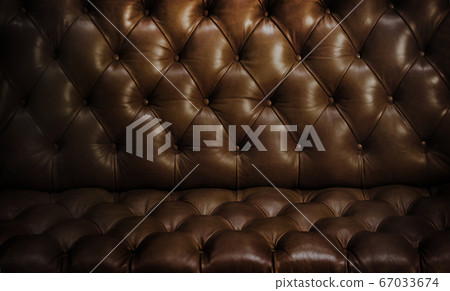 close up texture of brown leather sofa close up texture of brown leather sofa 67033674
