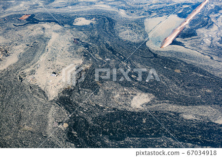 Water surface covered with mud 67034918