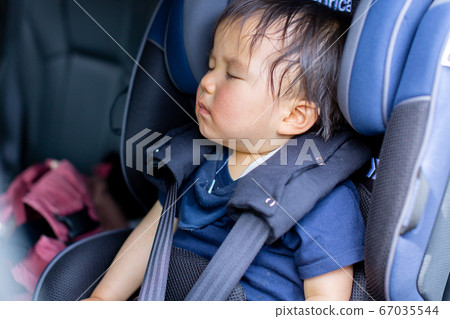 Infant sleeping on child seat Infant sleeping on child seat 67035544