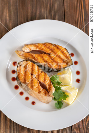 Grilled steaks of Arctic char 67036732