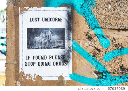 The Netherlands 13 June 2020, Poster on wall with a unicorn lost and found, if found, stop doing drugs. The Netherlands 13 June 2020, Poster on wall with a unicorn lost and found, if found, stop doing drugs. 67037089