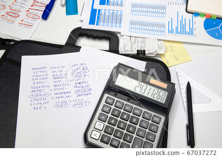 business office desk closeup - financial reports, 67037272