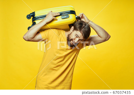 Man with a suitcase on his back 67037435