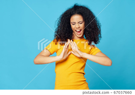 Cheerful national woman curly hair 67037660