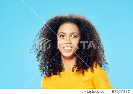 Beautiful curly hair woman charm smile 67037857