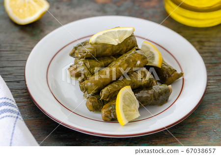Stuffed grape leaves with rice,olive oil and herbs 67038657